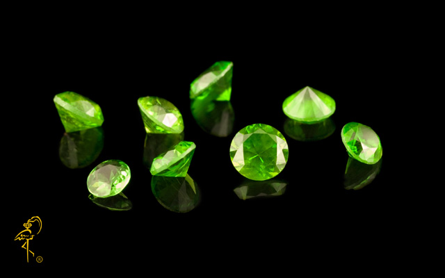 A faceted Russian demantoid from the stock of Golden Flamingo Company A faceted Russian demantoid from the stock of Golden Flamingo Jewelers