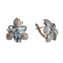 Floral Motif Blue Topaz and CZ Earrings. 585 (14kt) White Gold