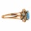 Ring with Round Blue Topaz and Champagne Diamonds. Angle 3