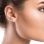 Flora-inspired Pink Nacre and Diamond Studs on a Model