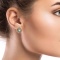 Blue Topaz and Diamond Galaxy Earrings in 585 Rose Gold on a Model