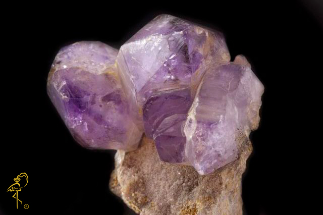 A natural amethyst druzy before a master jeweler from Golden Flamingo Jewelers starts his work A natural amethyst druzy before a master jeweler from Golden Flamingo Jewelers starts his work.