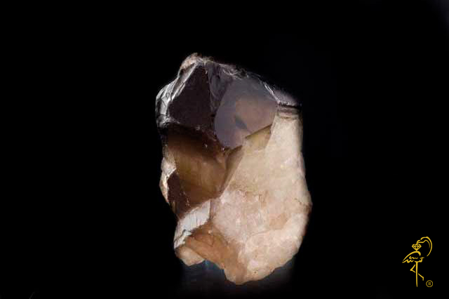 A natural smokey quartz druzy before a carving master from Golden Flamingo Jewelers starts his work A natural smokey quartz druzy before a carving master from Golden Flamingo Jewelers starts his work