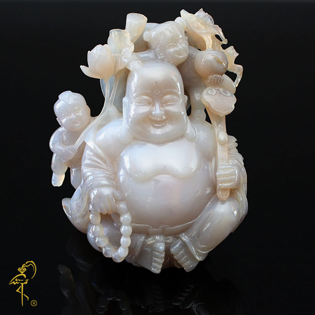 Blue chalcedony Buddha from the Carving Museum of the Golden Flamingo Jewelers view 1 Blue chalcedony Buddha from the Carving Museum of the Golden Flamingo Jewelers